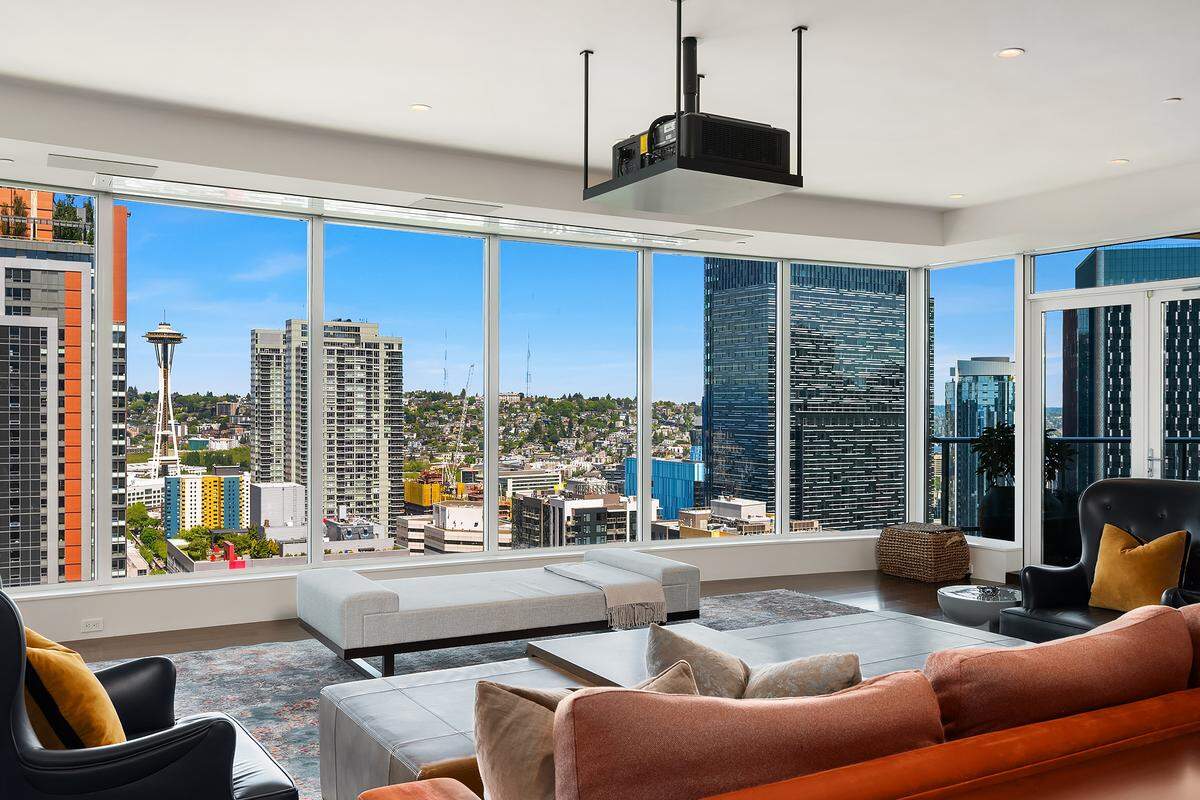 Spanning 5,180 square feet, PH101 commands half of the 30th floor, offering 180-degree views of Elliott Bay, the Olympic Mountains and city lights in Seattle.