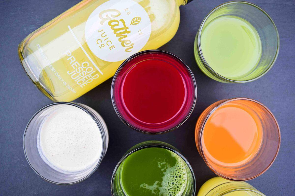 Gather Juice Co. in Tacoma offers a three-day juice cleanse with four juices, a housemade cashew milk (far left), and a daily wellness shot.