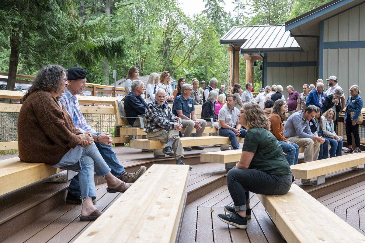 People sit in the new amphitheater at Kopachuck State Park on Friday, Aug. 1, 2025, during a tour ahead of the parks grand reopening on Saturday near Gig Harbor, Wash.