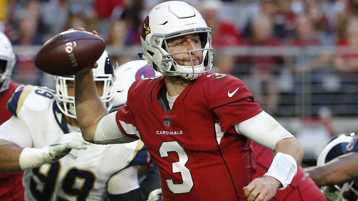 Arizona Cardinals quarterback Josh Rosen (3) looks to throw against the Los Angeles Rams during the first half of an NFL football game, Sunday, Dec. 23, 2018, in Glendale, Ariz. (AP Photo/Rick Scuteri)