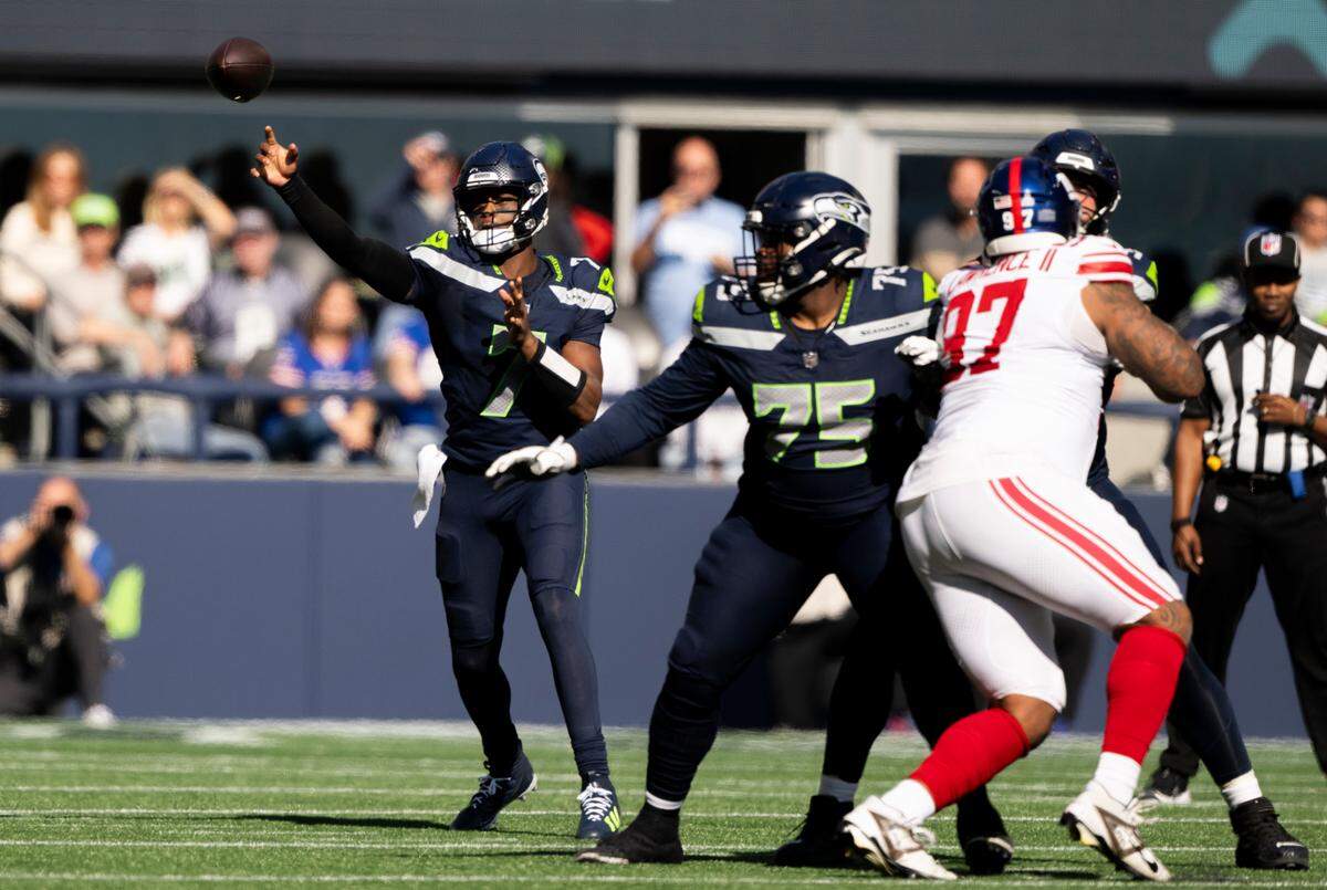 Seattle Seahawks quarterback Geno Smith (7) passes the ball during the first quarter of the game against the New York Giants at Lumen Field, on Sunday, Oct. 6, 2024 in Seattle, Wash.