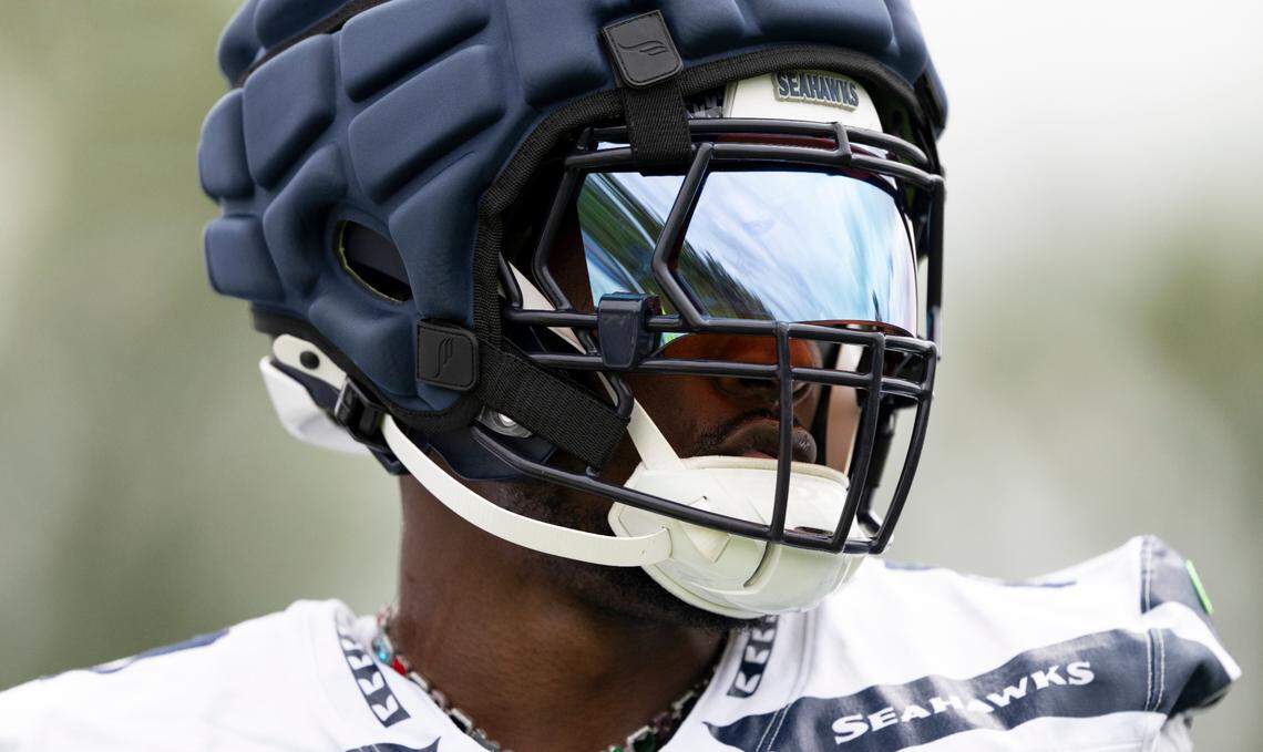 Seattle Seahawks defensive end DeMarcus Lawrence (0) runs drills during training camp at Virginia Mason Athletic Center on Friday, July 25, 2025, in Renton, Wash.