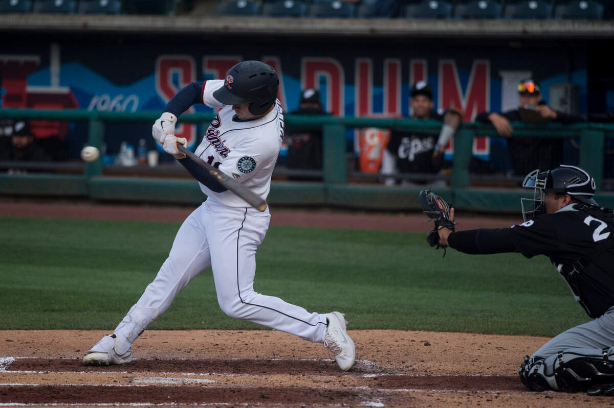 Tacoma Rainiers outfielder Jarred Kelenic swings at a pitch during a game against El Paso on Tuesday, May 11, 2021 at Cheney Stadium in Tacoma, Wash.
