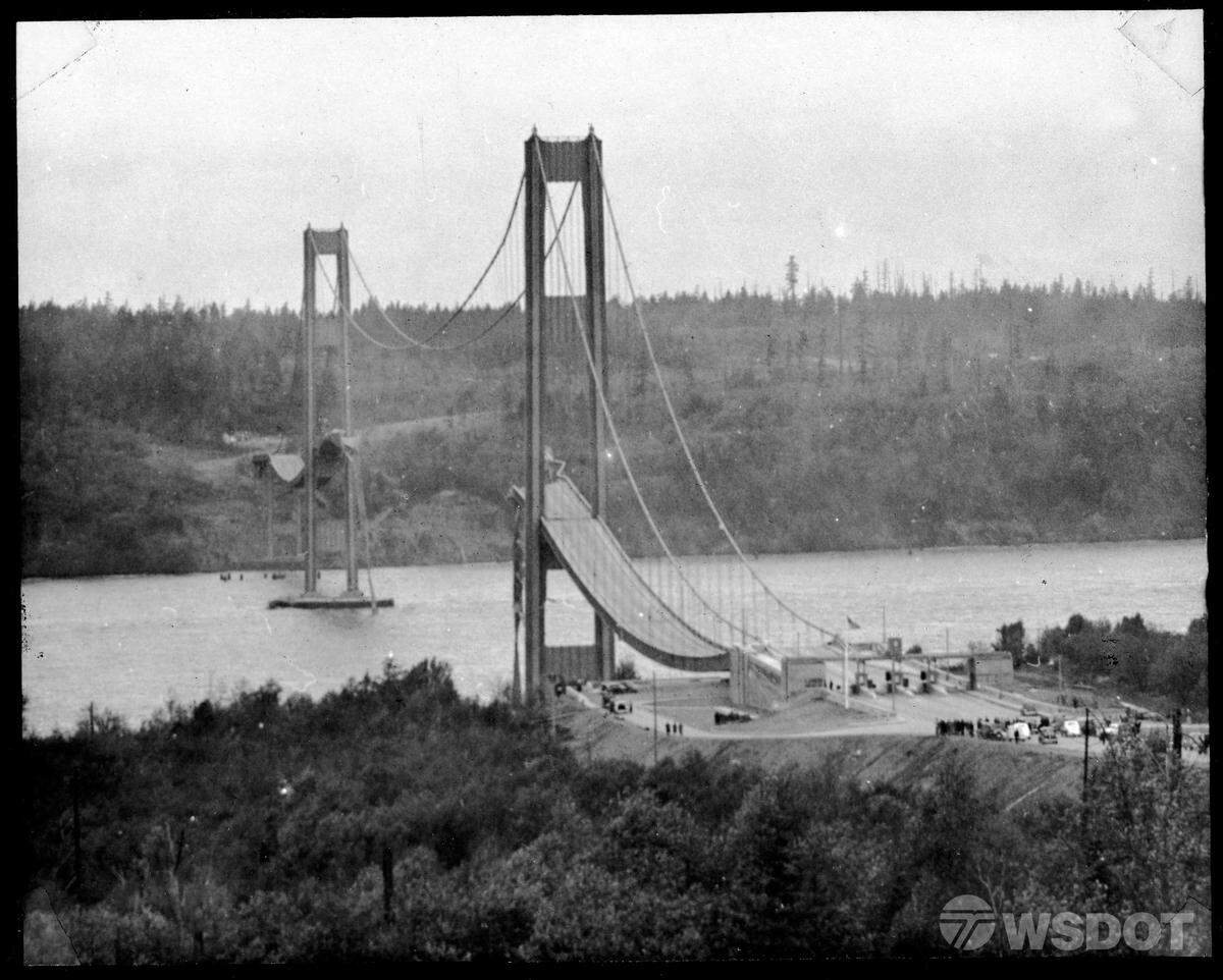 People gathered to look at the ruined bridge. The collapse changed how engineers design suspension bridges today.