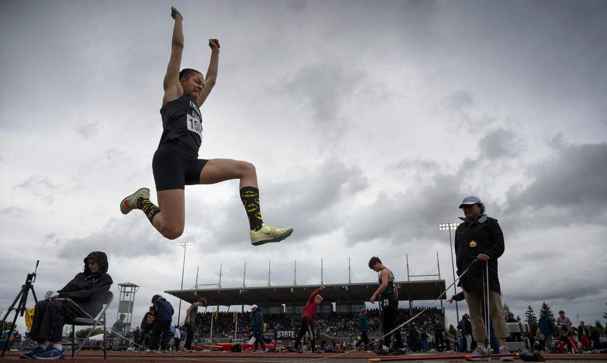 Emerald Ridge’s JaiCieonna Gero-Holt flies through the air en route to winning a state championship in the 4A girls long jump competition during the second day of the WIAA State Track and Field Championships at Mount Tahoma High School in Tacoma, Washington on Friday, May 27, 2022.