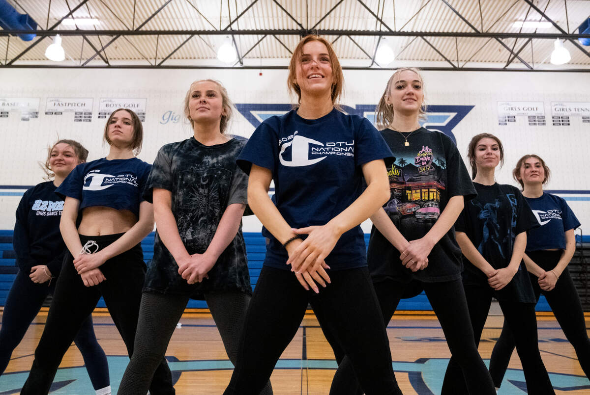 The H2Whoa Gig Harbor high school dance team practices in the school’s gym as they prepare for the district competition on Saturday in Gig Harbor, Wash. on Wednesday, March 2, 2022.