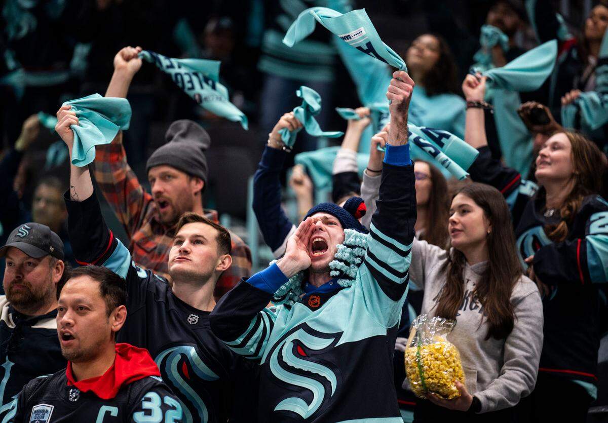 Seattle Kraken fans cheer and shout from the stands after the Kraken’s tied their game in the second period of a first round 2023 Stanley Cup Playoffs game against the Colorado Avalanches at Climate Pledge Arena in Seattle on Saturday, April 22, 2023. The Seattle Kraken lost 4-6 to the Colorado Avalanches.