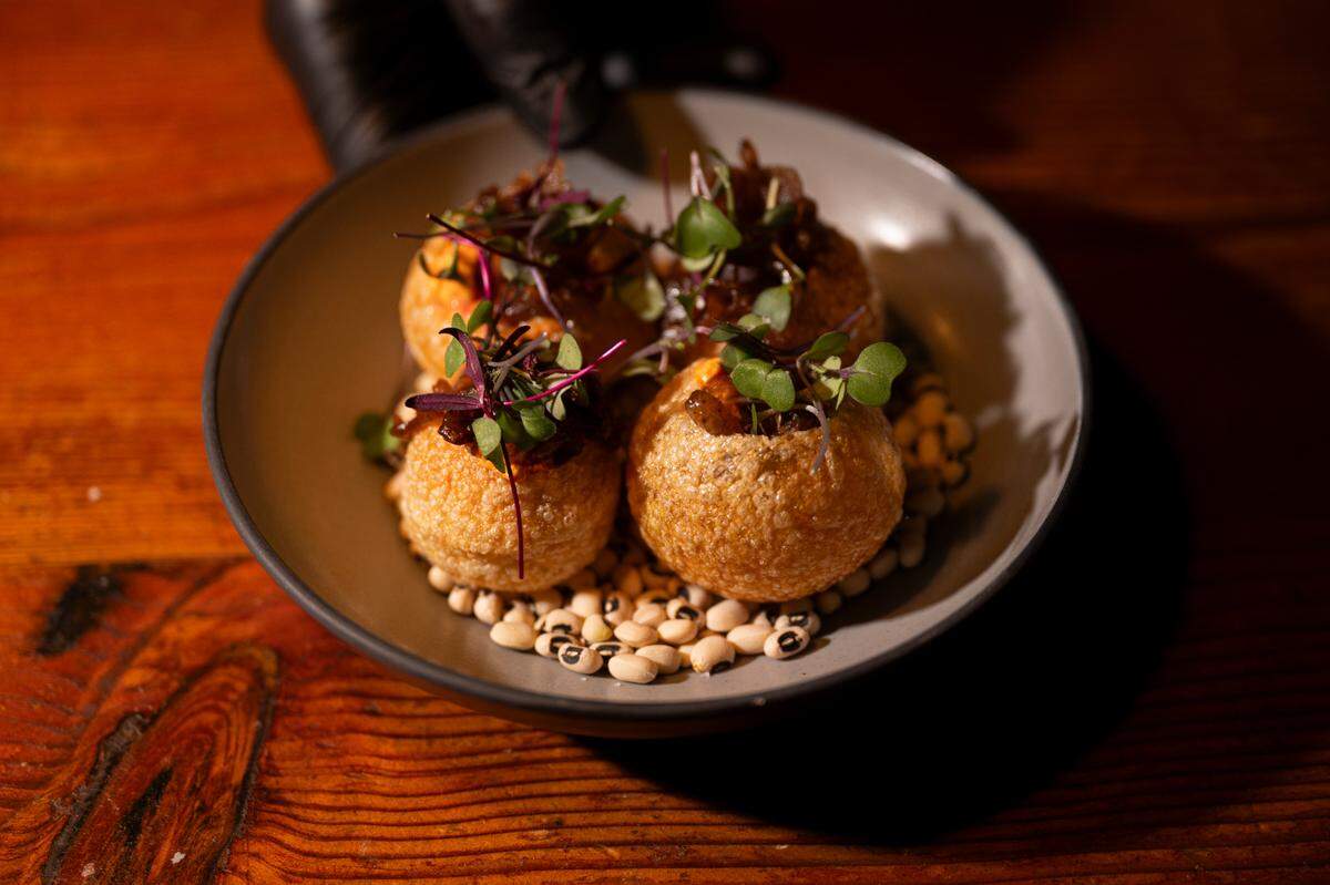 Pani puri is one of several classic Indian dishes that gets some Southern-Creole attention at Grann.
