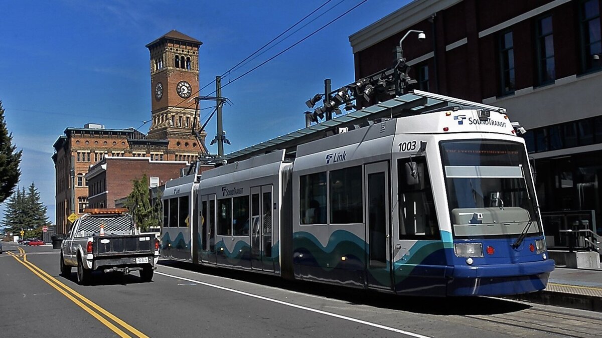 A Tacoma Link light rail vehicle stops at the current downtown terminus on Pacific Avenue, a couple blocks from Old City Hall. A planned extension would route the system through the Stadium District, then up Division Street into the Hilltop. Photo taken in Tacoma on Thursday, Nov. 16, 2017.