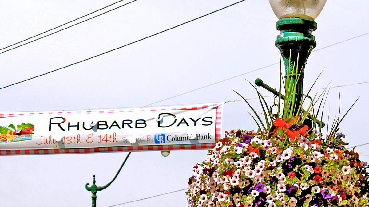 The Rhubarb Days banner is displayed on Main Street in Sumner.