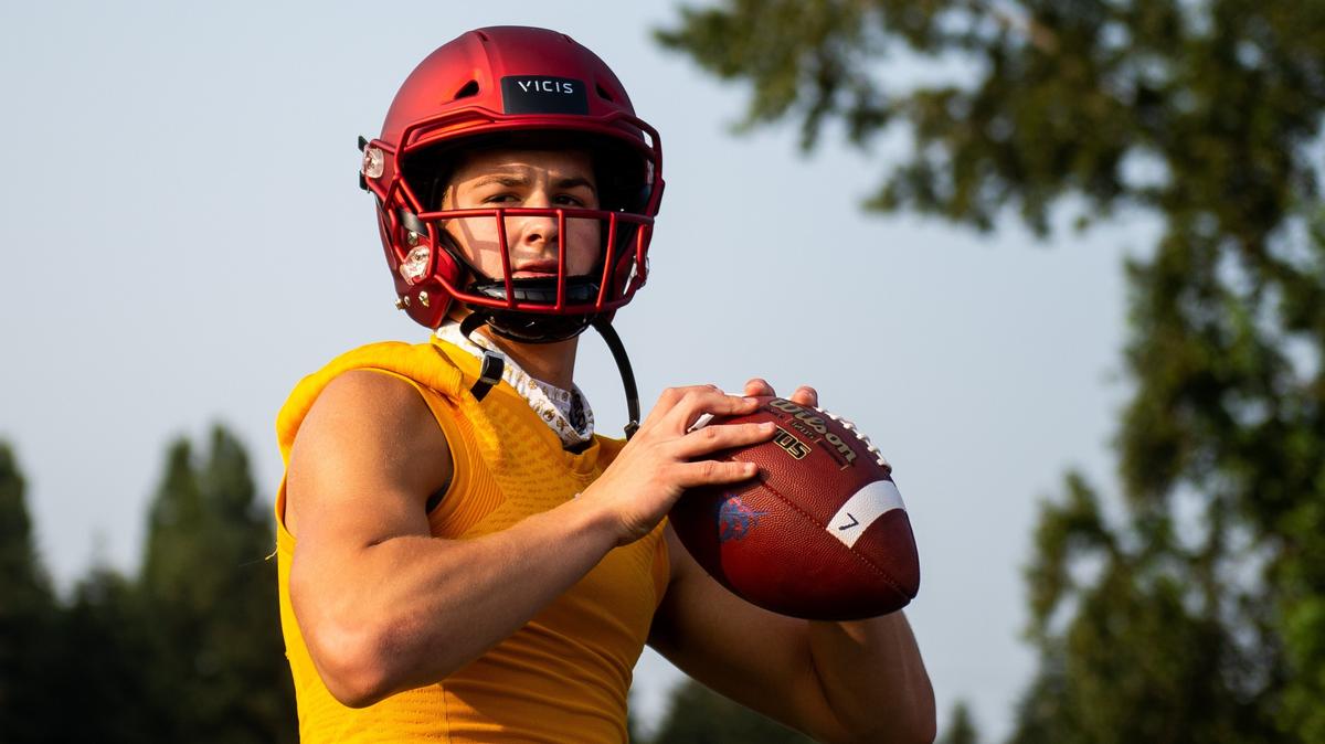 Quarterback Sam Huard throws a pass during Kennedy Catholic High School football practice at Kennedy Catholic High School in Burien, Wash., on Thursday, Aug. 16, 2018.