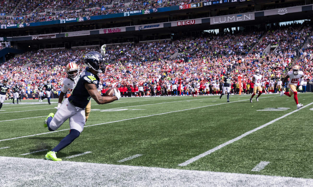 Seattle Seahawks wide receiver Jaxon Smith-Njigba (11) runs out of bounds after the catch during the first quarter of the game against the San Francisco 49ers at Lumen Field, on Sunday, Sept. 7, 2025, in Seattle.