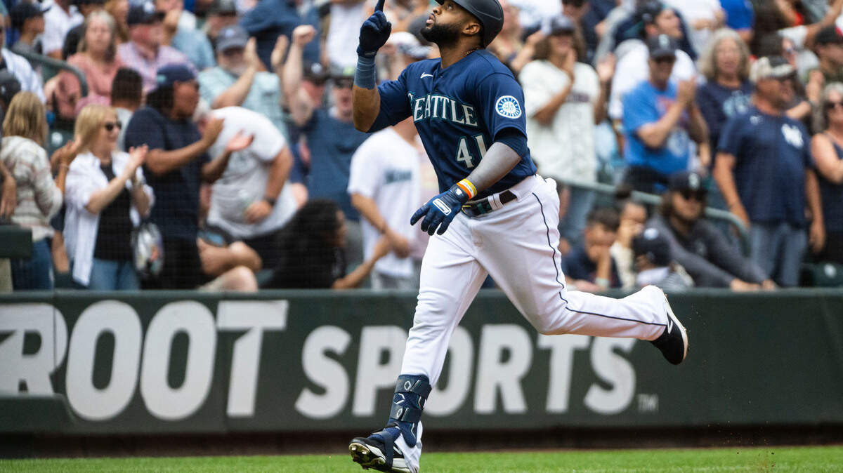 Seattle Mariners first baseman Carlos Santana (41) points to the sky after hitting a home-run in eighth inning of the game at T-Mobile Park in Seattle, Wash. on August 10, 2022. The Mariners had their first season series win over the Yankees in 20 years at 4-2, after defeating them 4-3 in Wednesday’s game.