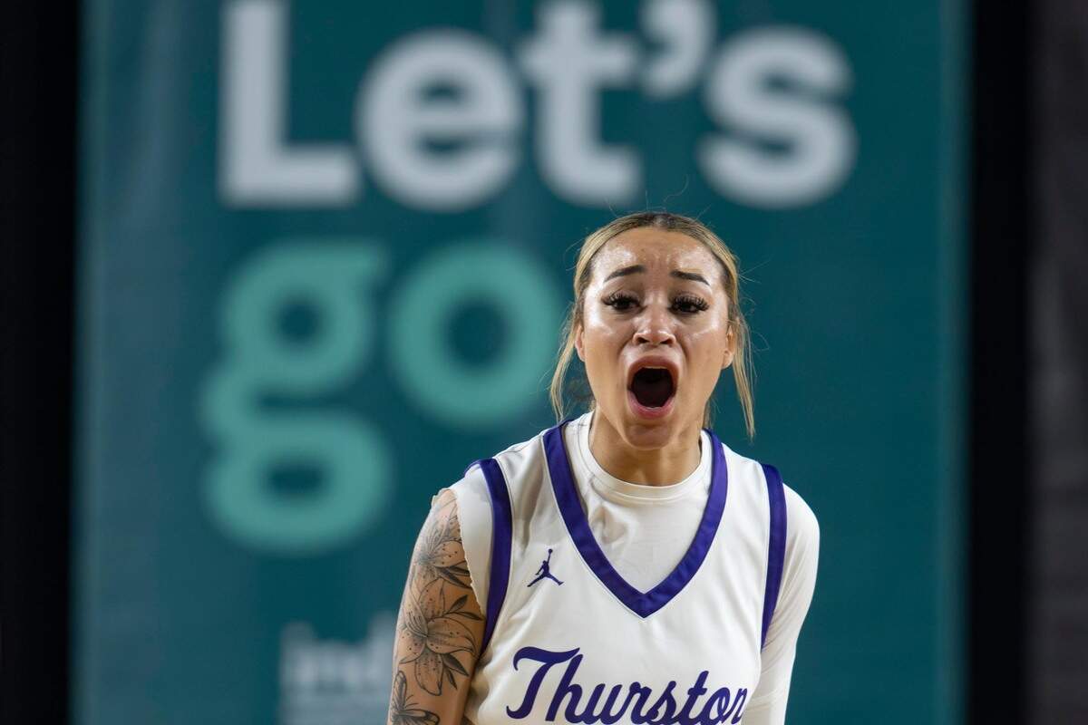 North Thurston guard Shayla Cordis (4) encourages her team after a Lakeside turnover during the second quarter of a Class 3A state basketball tournament semifinal game at the Tacoma Dome on Friday, March 7, 2025, in Tacoma.