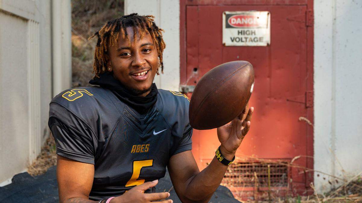 Lincoln senior QB Gabarri Johnson poses for a portrait on Wednesday, Aug. 17, 2022, at Lincoln High School in Tacoma, Wash. Johnson is widely considered the best quarterback in the state this fall. He’ll look to lead the Abes to another 3A PCL title and a state tournament run.