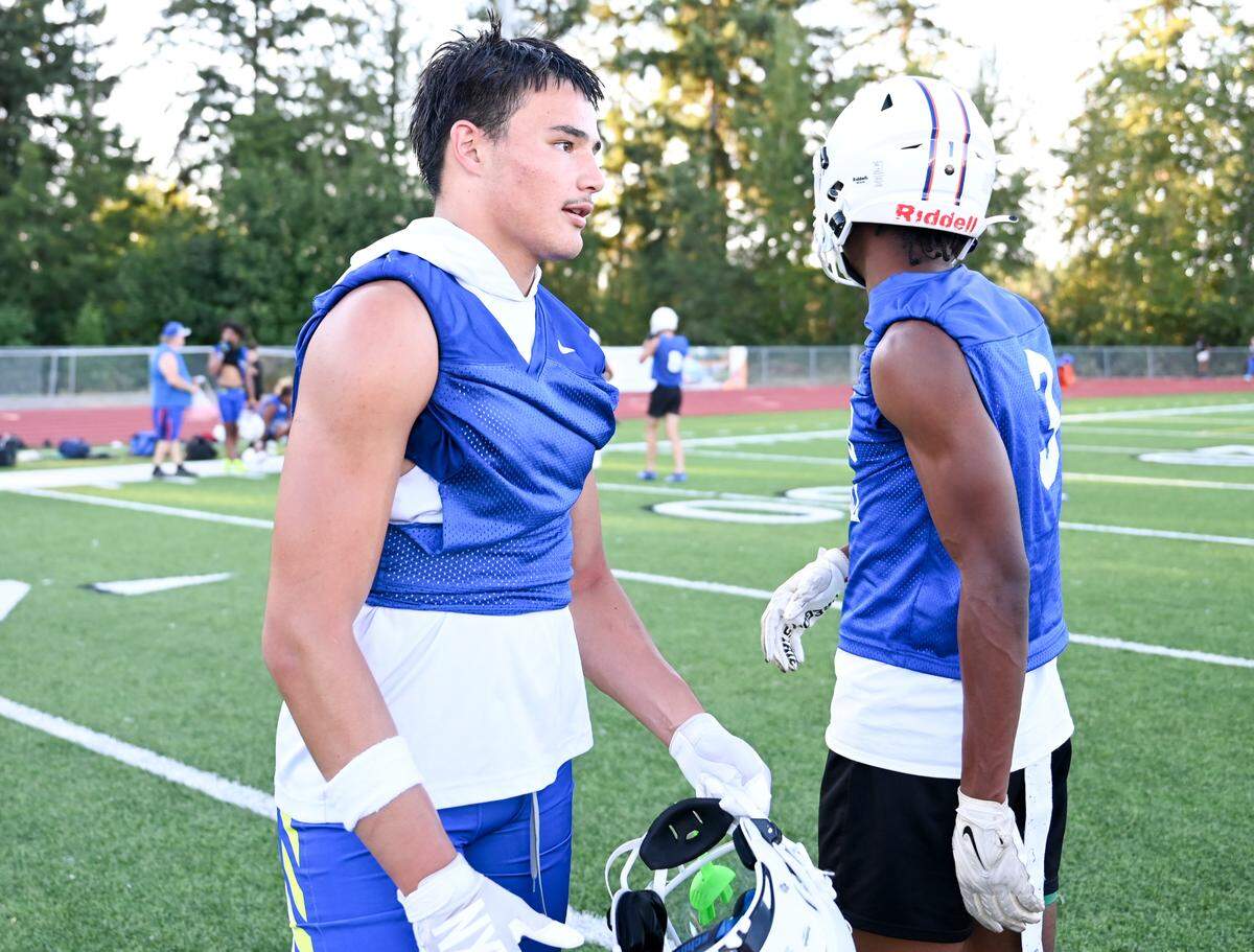 Graham-Kapowsin tight end Noah Flores walks in to run a play during a football practice at Graham-Kapowsin High School, Wednesday, Aug. 16, 2023, in Graham, Wash.
