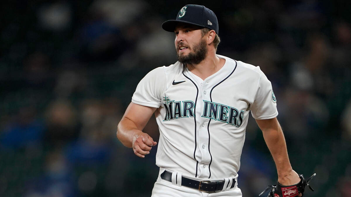 Seattle Mariners relief pitcher Kendall Graveman reacts as Mariners third baseman Dylan Moore catches a line drive hit by Los Angeles Dodgers’ Will Smith to end the top of the seventh inning of a baseball game, Monday, April 19, 2021, in Seattle. (AP Photo/Ted S. Warren)