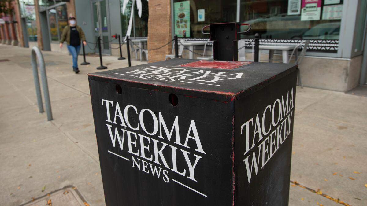 A Tacoma Weekly dispenser downtown on Pacific Avenue on Oct. 19, 2020. The newspaper is available for free.