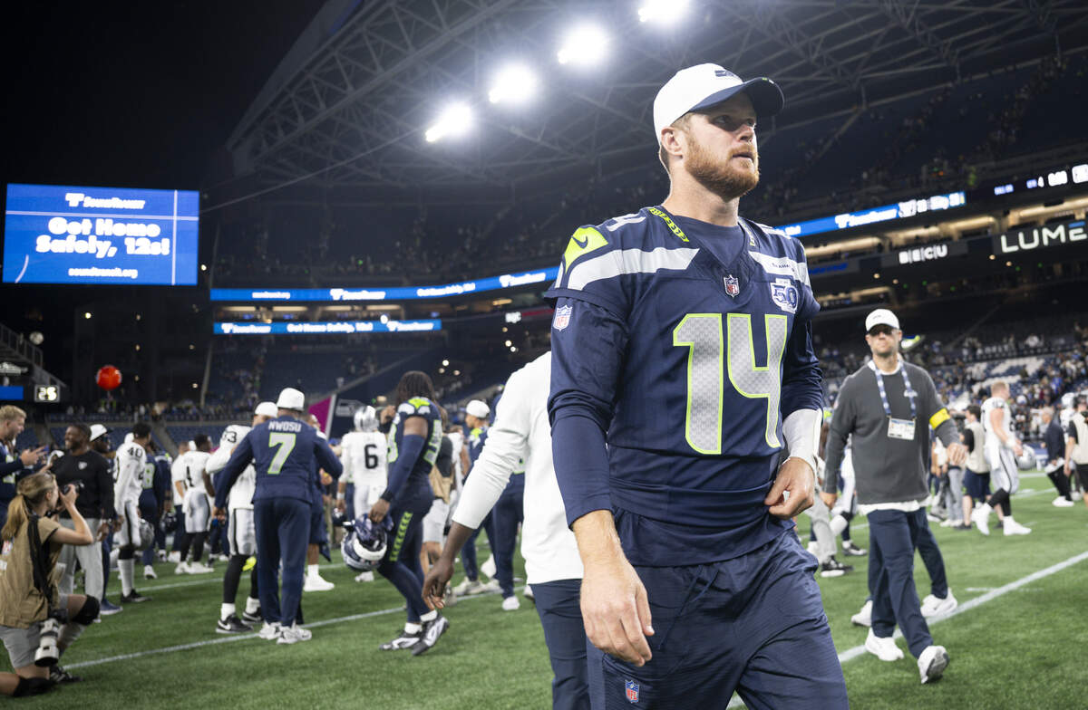 Seattle Seahawks quarterback Sam Darnold (14) walks off after the Seattle Seahawks and Las Vegas Raiders 23-23 game at Lumen Field, on Thursday, Aug. 7, 2025, in Seattle, Wash.