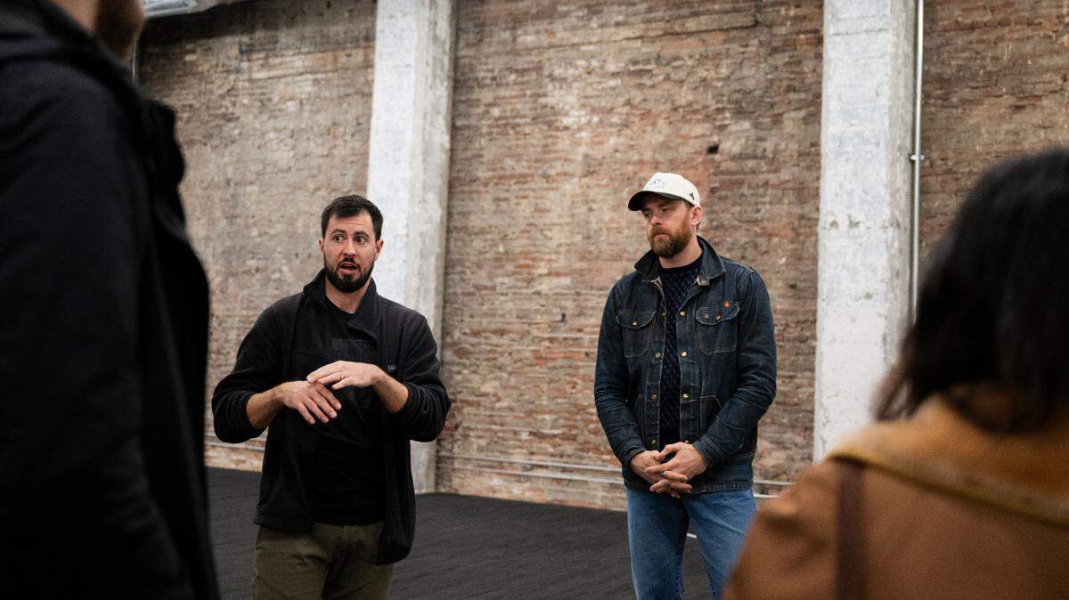 Co-owners Jon Green and Abe Fox tour the new location of Wooden City with their management team in Tacoma, on Wednesday, Oct. 30, 2024.