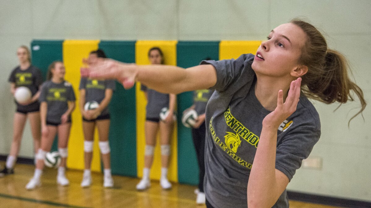 Kate Wick practices a serve with her Kentridge High School girls volleyball team. The Chargers are undefeated in regular-season play. November 12, 2018