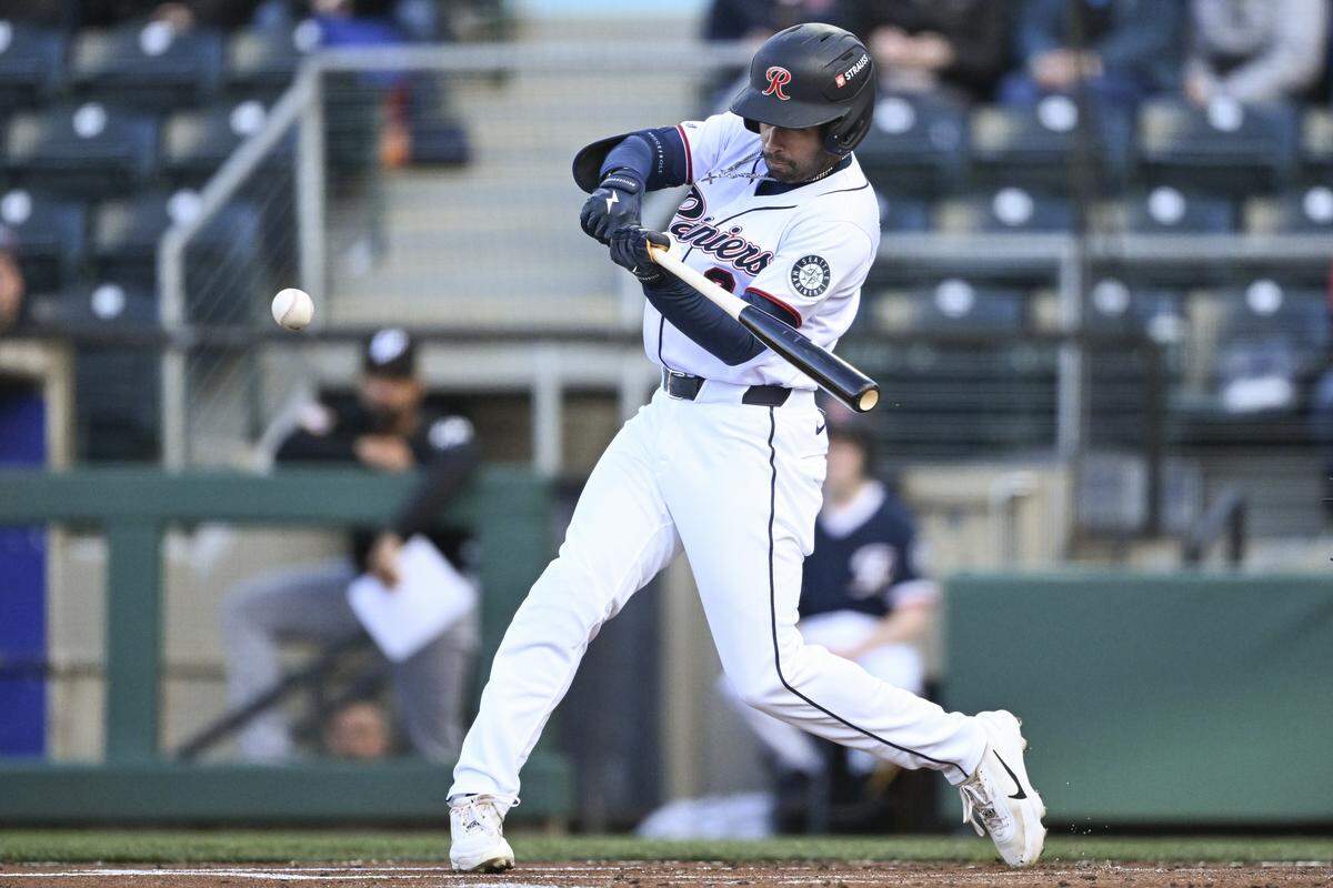 Tacoma Rainiers center fielder Rhylan Thomas (2) swings at bat during a game against the El Paso Chihuahuas on Tuesday, March 31, 2026, Cheney Stadium in Tacoma, Wash.