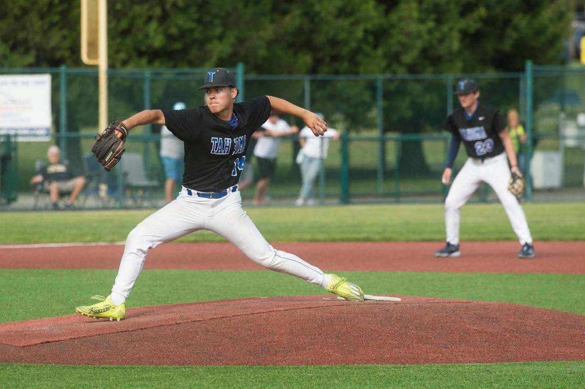 Tahoma starter Adam Jay (14) throws a pitch in a baseball game against Olympia in the Class 4A state quarterfinals on Saturday, May 20, 2023 at the Regional Athletic Complex in Lacey, Wash.