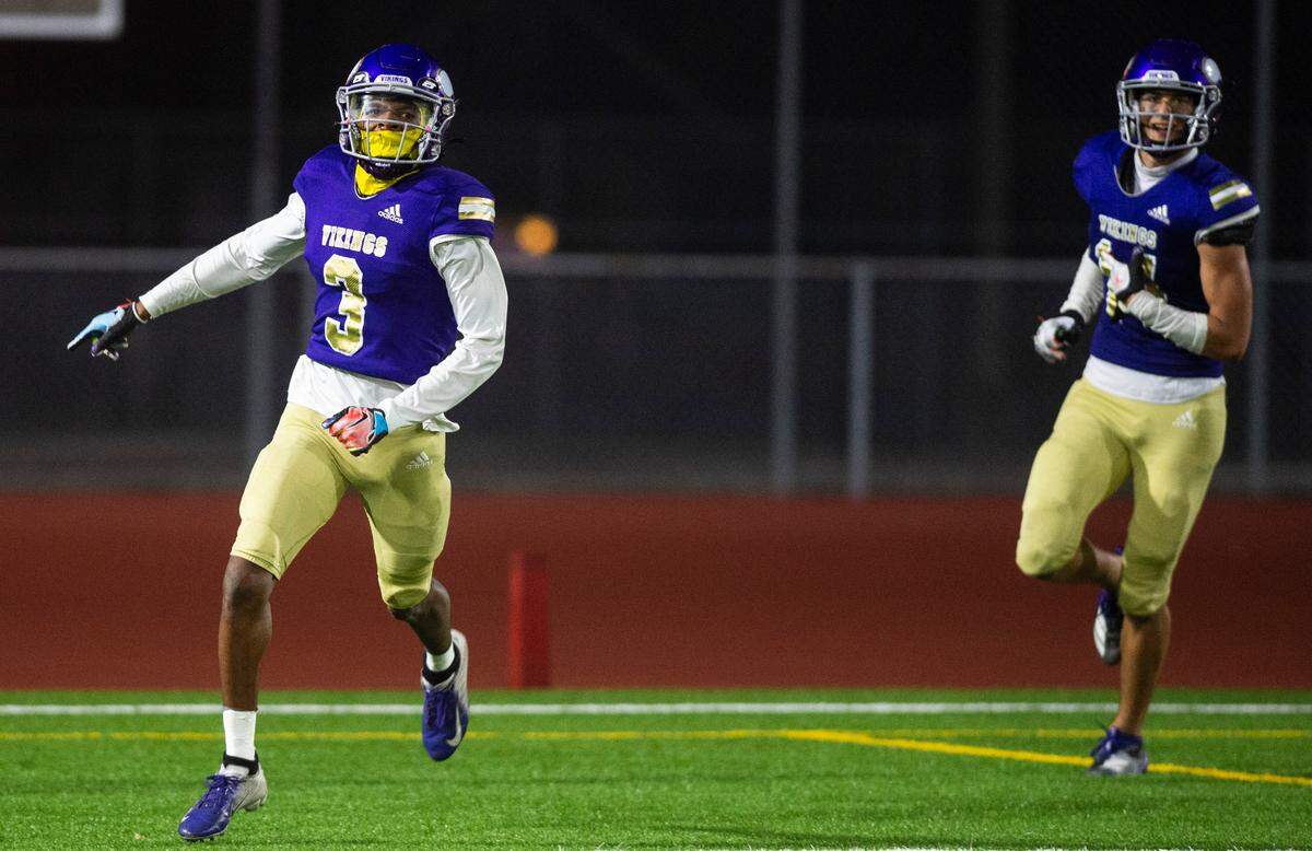 Puyallup wide receiver Mal Durant (3) celebrates after scoring a touchdown in the third quarter of a game at Sparks Stadium in Puyallup, Wash. on Oct. 6, 2022. Puyallup defeated Olympia 29-24.