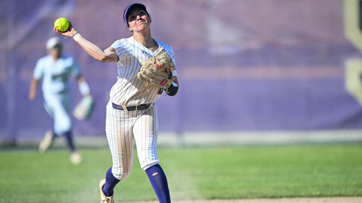 Puyallup’s Paisley Jamison (2) throws to first base to retire an Emerald Ridge player and end the inning during the softball game at Puyallup High School, on Friday, April 18, 2025, in Puyallup, Wash.