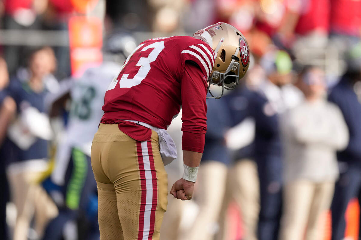 San Francisco 49ers quarterback Brock Purdy (13) celebrates after throwing a touchdown pass to wide receiver Deebo Samuel during the first half of an NFL football game against the Seattle Seahawks in Santa Clara, Calif., Sunday, Dec. 10, 2023. (AP Photo/Godofredo A. Vásquez)