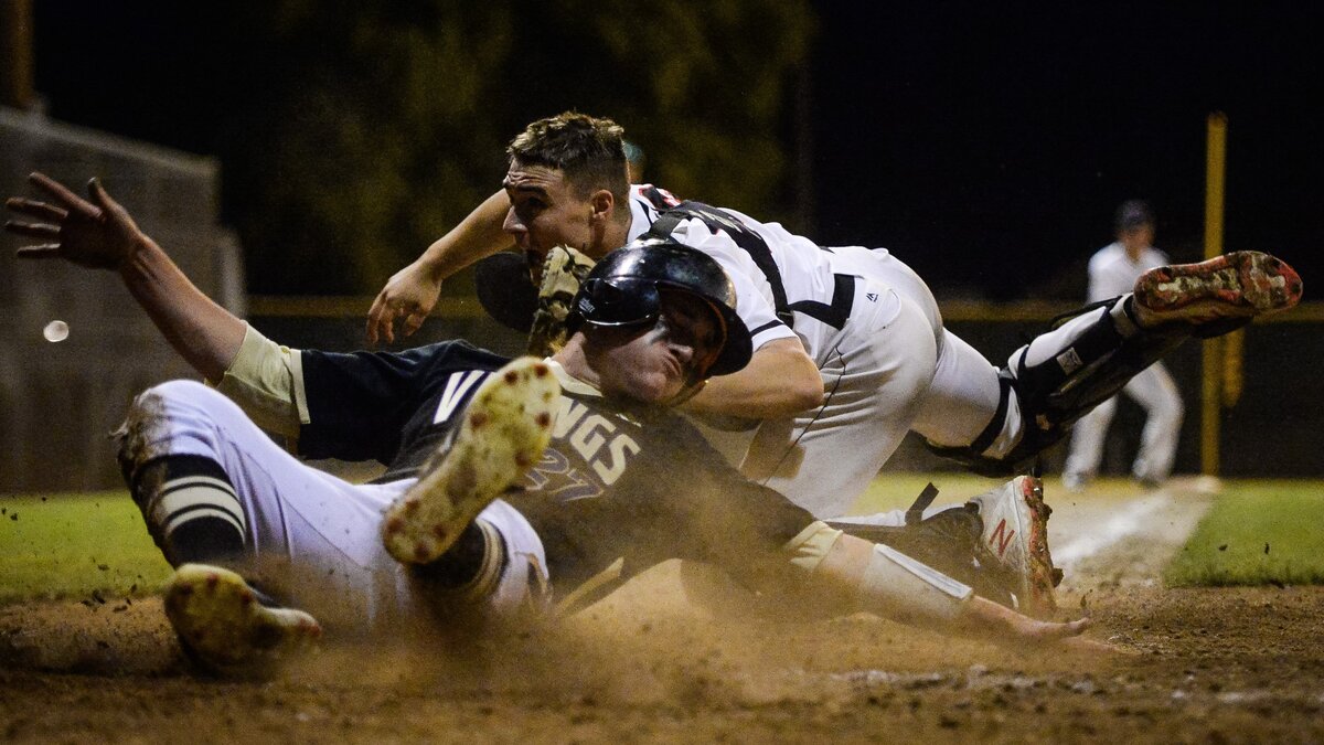 Camas catcher Grant Heiser tags out Puyallup’s Evan Scavatto at the plate in the fifth inning for the last out in the inning. Puyallup played Camas in a baseball game at Art Wright Field in Kent, Wash., on Saturday, May 11, 2019.