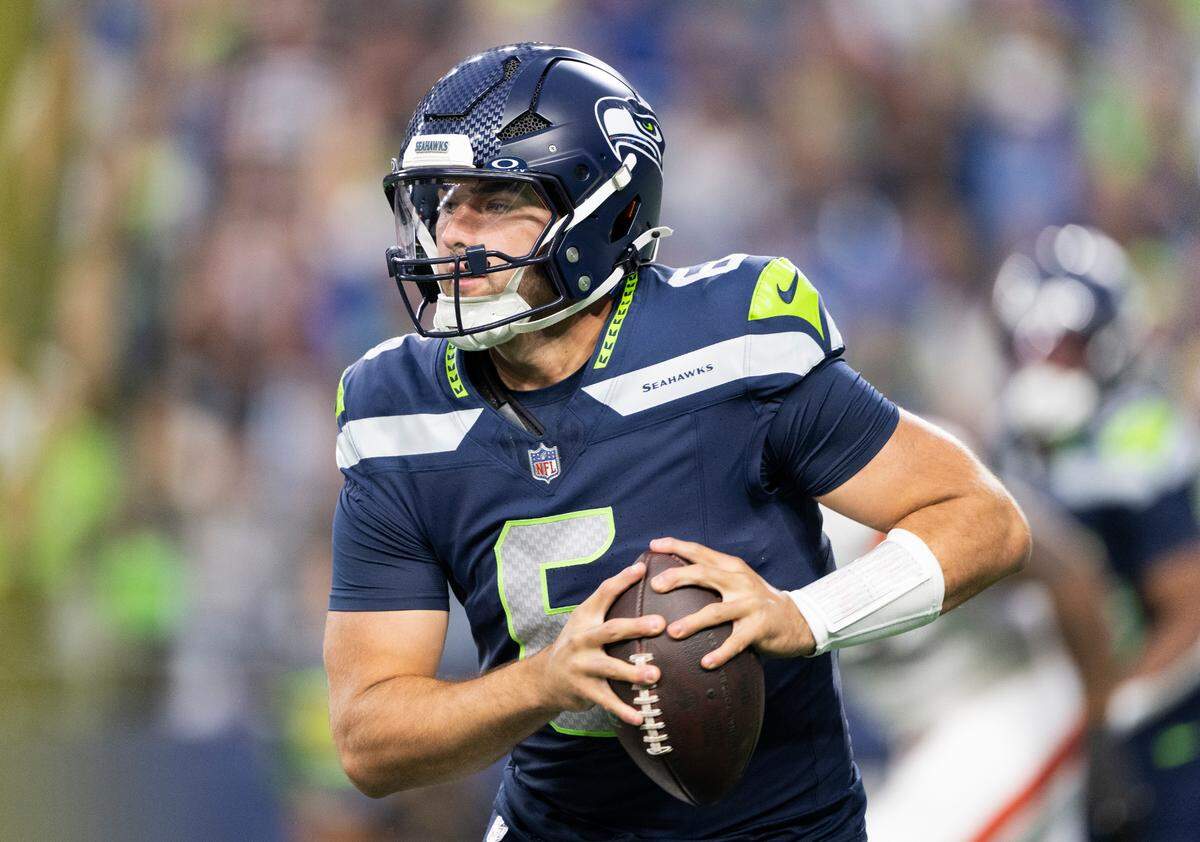 Seattle Seahawks quarterback Sam Howell scrambles during the first quarter of the preseason game against the Cleveland Browns at Lumen Field, on Saturday, Aug. 24, 2024 in Seattle, Wash.