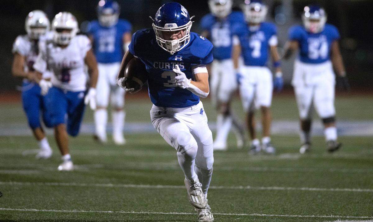 Curtis wide receiver Parker Mady breaks loose for a touchdown during Friday night’s 4A SPSL football game against the Graham Kapowsin Eagles at Viking Stadium in University Place, Washington, on Oct. 6, 2023. Graham Kapowsin won the game, 42-35.