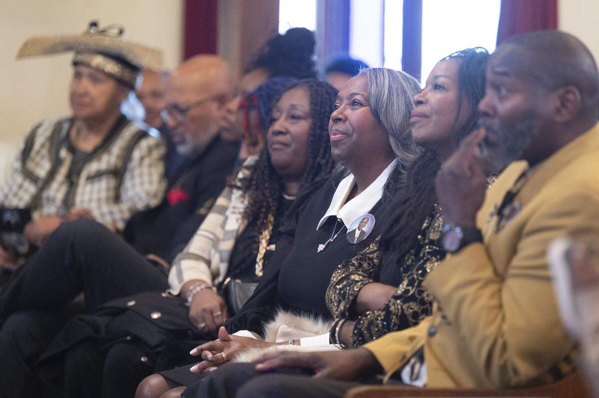 Family of Bishop Curtis E. Montgomery listen as community and family members give remarks at an honorary street renaming ceremony for Curtis E. Montgomery Street on Saturday, Dec. 27, 2025, at Greater Christ Temple Church in Tacoma, Wash.