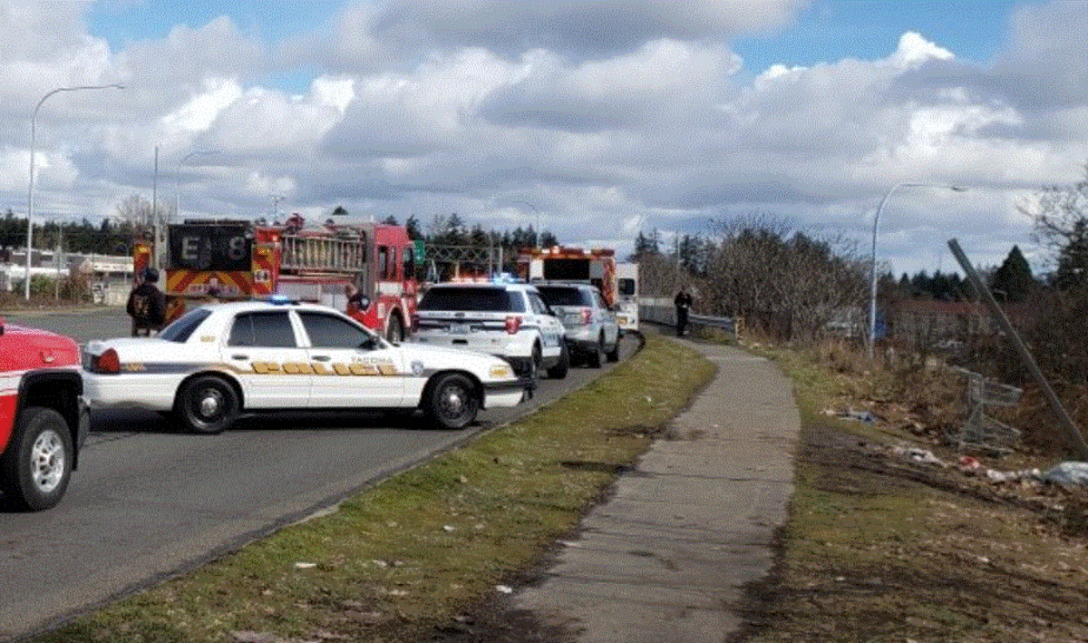 A shooting Tuesday morning at a Tacoma homeless encampment left a 26-year-old man dead and a dog wounded.