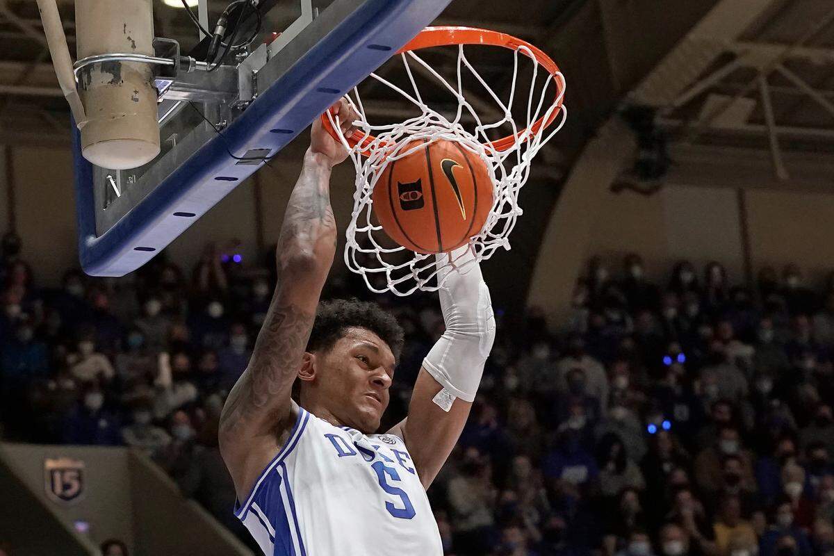 Duke forward Paolo Banchero (5) dunks against Florida State during the second half of an NCAA college basketball game in Durham, N.C., Saturday, Feb. 19, 2022. (AP Photo/Gerry Broome)