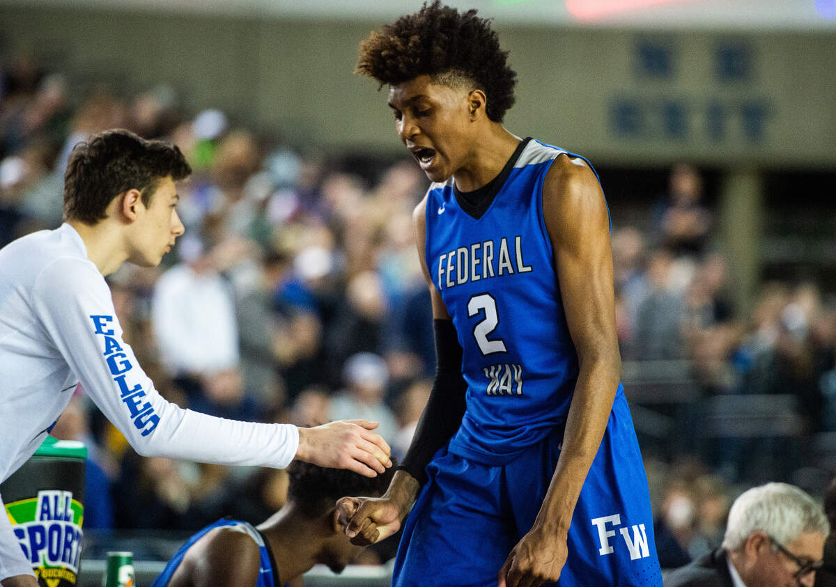 Federal Way’s Jaden McDaniels reacts after fouling out in the fourth quarter. Federal Way played Gonzaga Prep in a basketball game at the Hardwood Classic State Basketball Tournament at the Tacoma Dome in Tacoma, Wash., on Friday, March 1, 2019.