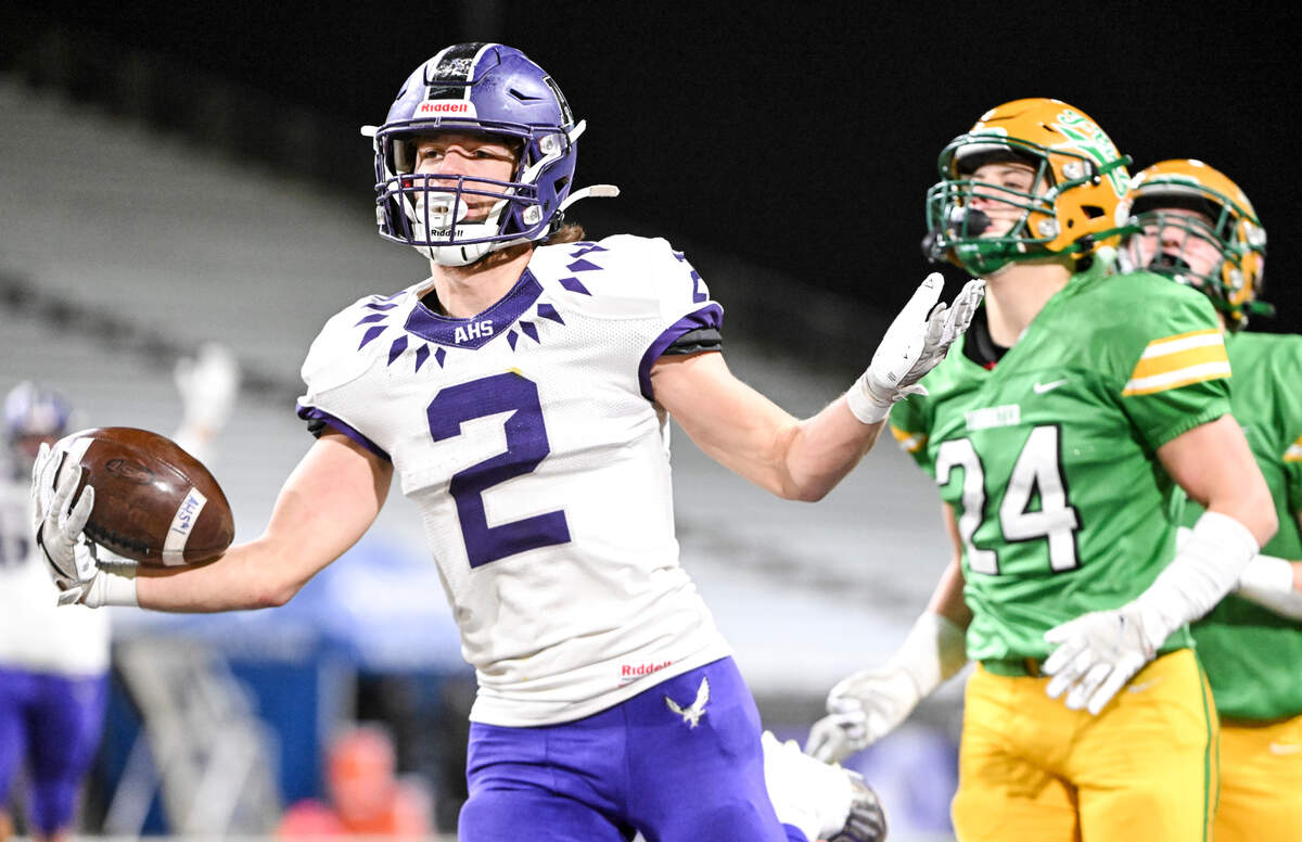 Anacortes’s Brady Beaner (2) celebrates a touchdown against Tumwater during the second half of the 2A state championship game at Husky Field, Saturday, Dec. 2, 2023, in Seattle, Wash.