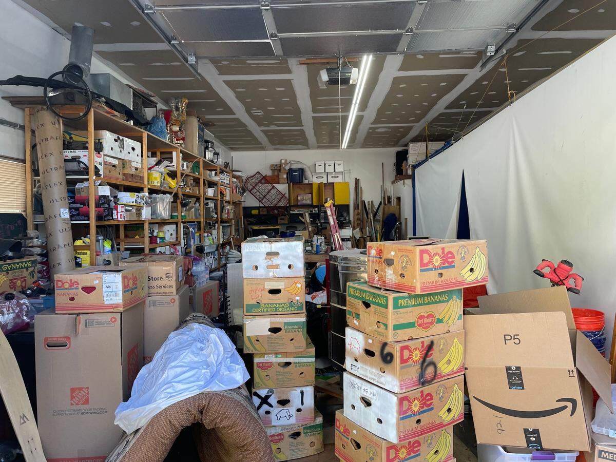 Gig Harbor area resident Jess Almeida described her garage before Gig Harbor Women’s Co-op members helped her clear it out for a new community space as stacked with boxes from “literally floor to ceiling,” pictured Sept. 24, 2024. The space opened as the co-op’s first physical space, called The Nest, on June 22, 2025.
