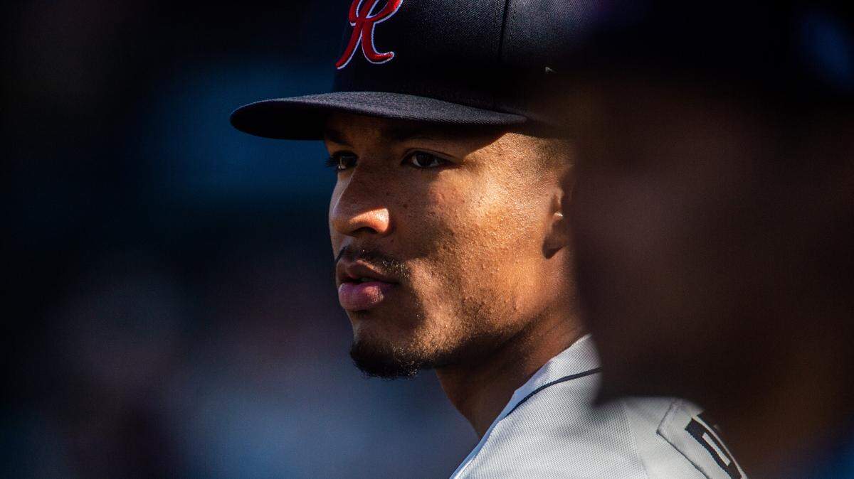 Robert Perez watches the game from the dugout. The Tacoma Rainiers played the Nashville Sounds at Cheney Stadium in Tacoma, Wash., on Saturday, June 8, 2019.