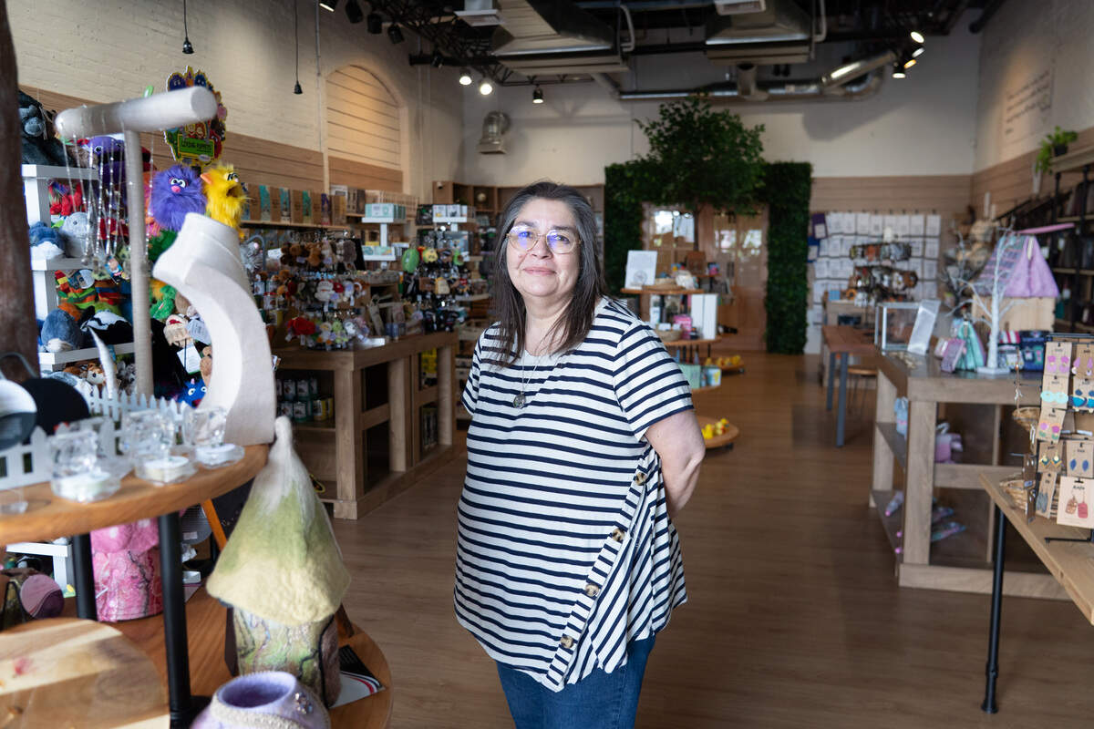 Store owner Norma Irish poses for a portrait inside Eco Repurpose Boutique on June 4, 2026.
