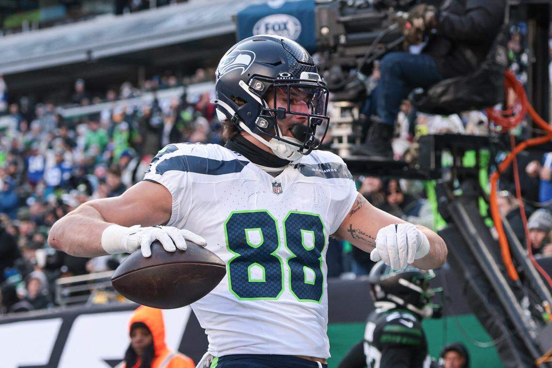 Seattle Seahawks tight end AJ Barner (88) celebrates after scoring a touchdown during the first half against the New York Jets at MetLife Stadium. Mandatory Credit: Vincent Carchietta-Imagn Images