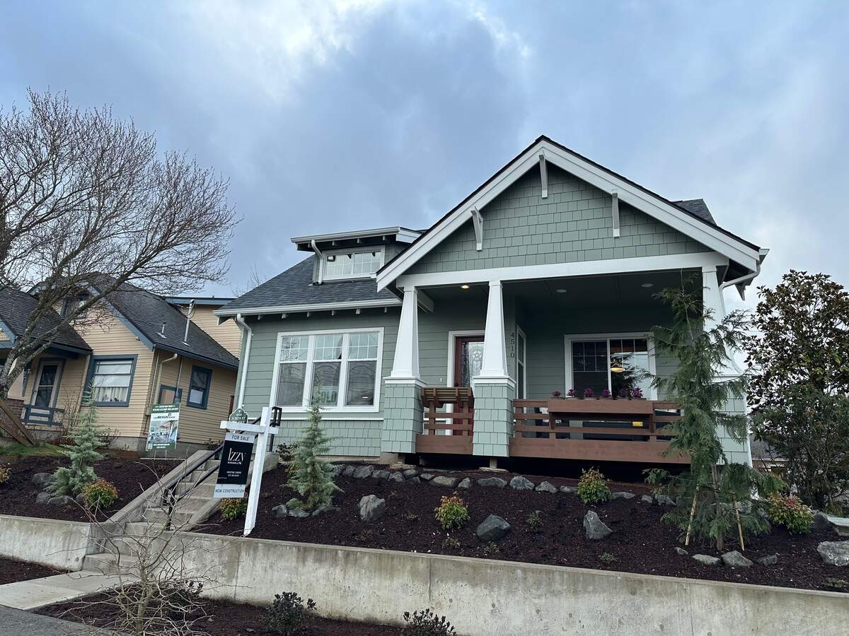 A custom home at 4510 N. 26th St. is accompanied by two townhomes behind it on the lot. The site is the first unit lot subdivision completed under the Home in Tacoma initiative to create more missing-middle housing.
