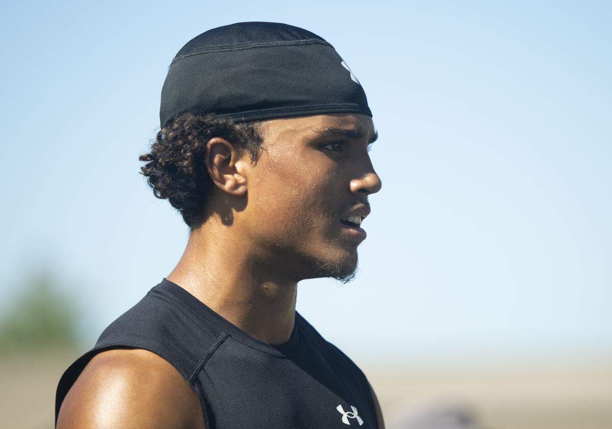 Sumner wide receiver Braylon Pope looks on during a football practice at Sumner High School on Friday, Aug. 22, 2025, in Sumner, Wash.