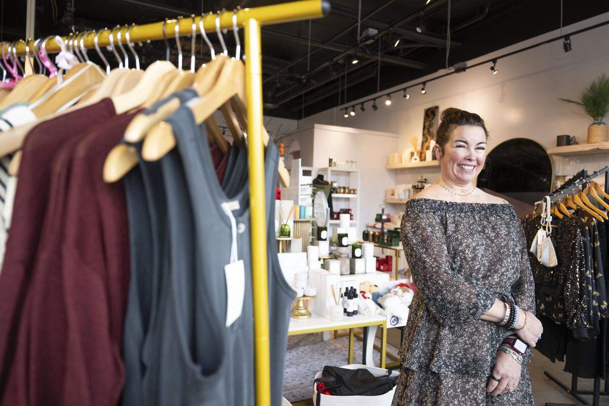 Owner Angela Low stands inside of Swank Boutique for a portrait on Tuesday, Jan. 27, 2026, in University Place, Wash.