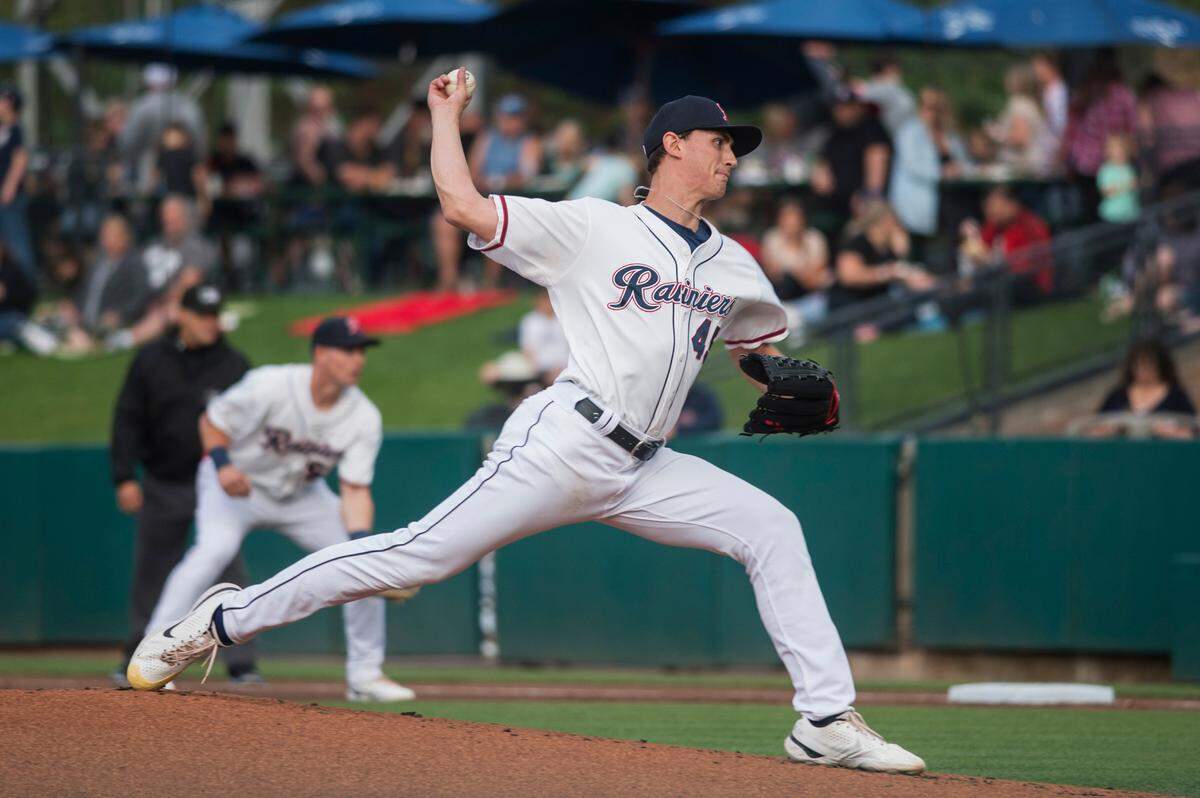 Tacoma Rainiers starter George Kirby throws a pitch during a Triple-A baseball game against the Oklahoma City Dodgers on Saturday, July 16, 2022 at Cheney Stadium in Tacoma, Wash.