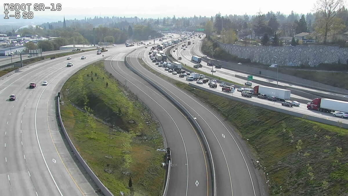 Live power lines fell on northbound Interstate 5 in Tacoma, causing two lane closures and an off ramp closure. Traffic was backed up about four miles.