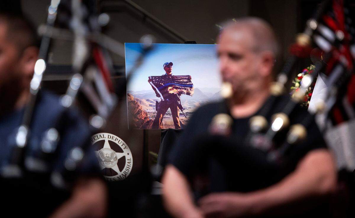 The Snohomish County Fire Pipe & Drum corps rehearses before the celebration of life ceremony for Pierce County Sheriff’s Deputy Dom Calata at Church For All Nations in Parkland, Washington, on Friday, March 25, 2022.
