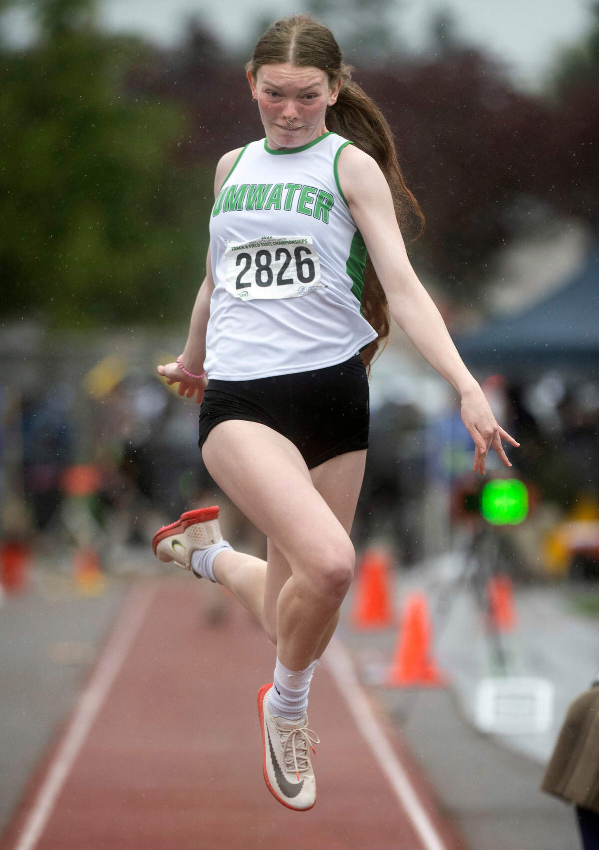 Tumwater’s Alyssa Duncan jumps to a state championship in the 2A girls triple jump competition during the final day of the WIAA State Track and Field Championships at Mount Tahoma High School in Tacoma, Washington on Saturday, May 28, 2022.