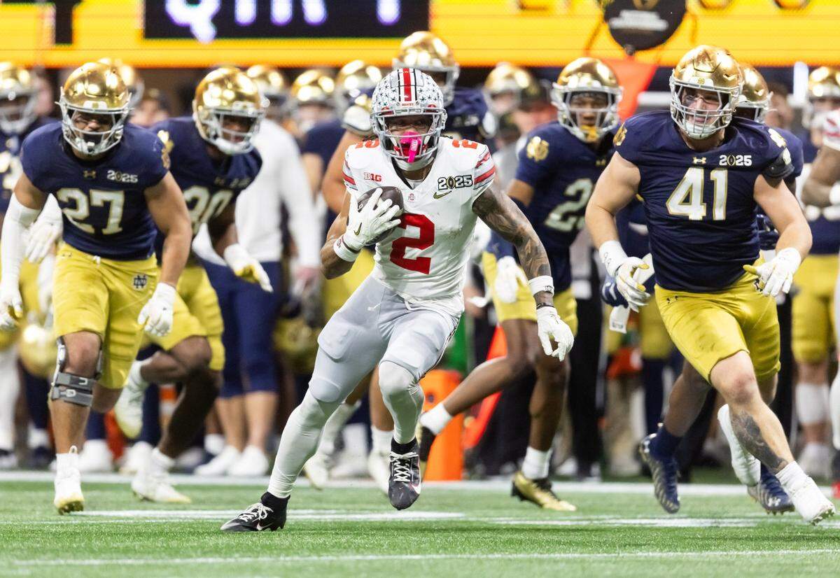 Jan 20, 2025; Atlanta, GA, USA; Ohio State Buckeyes wide receiver Emeka Egbuka (2) against the Notre Dame Fighting Irish during the CFP National Championship college football game at Mercedes-Benz Stadium. Mandatory Credit: Mark J. Rebilas-Imagn Images